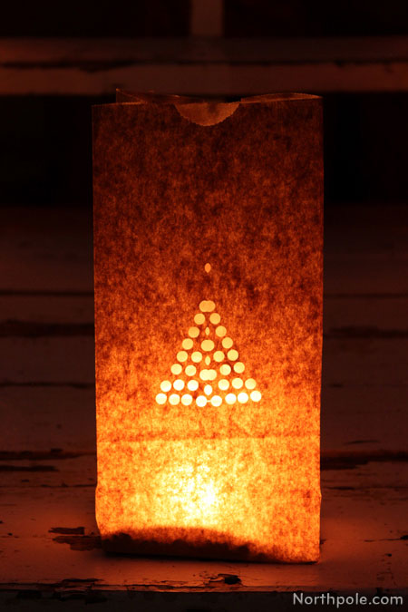Paper Bag Luminaries: Fold the bag in half and use a 1/4 inch one-hole punch to cut out a polka dot Christmas tree.