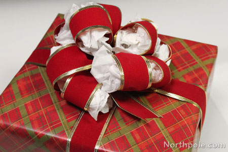 Use tissue paper to keep bows looking fluffy year after year.